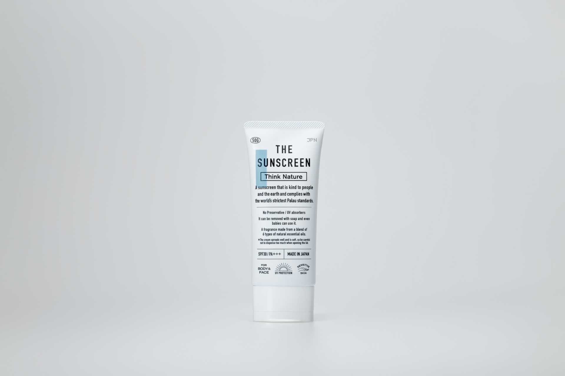 白色背景中央直立放置 THE SUNSCREEN Think Nature 50g 管裝防曬乳的正式產品實拍。